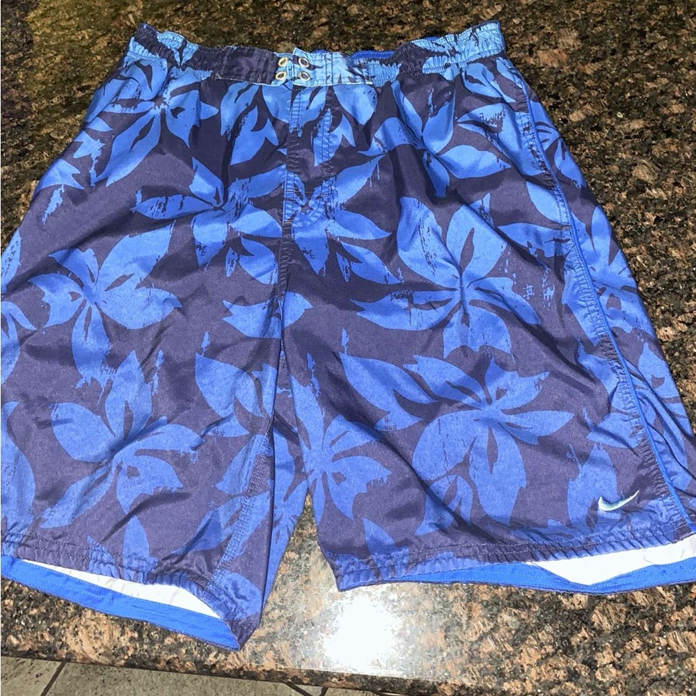 blue men’s Nike Swim Shorts
